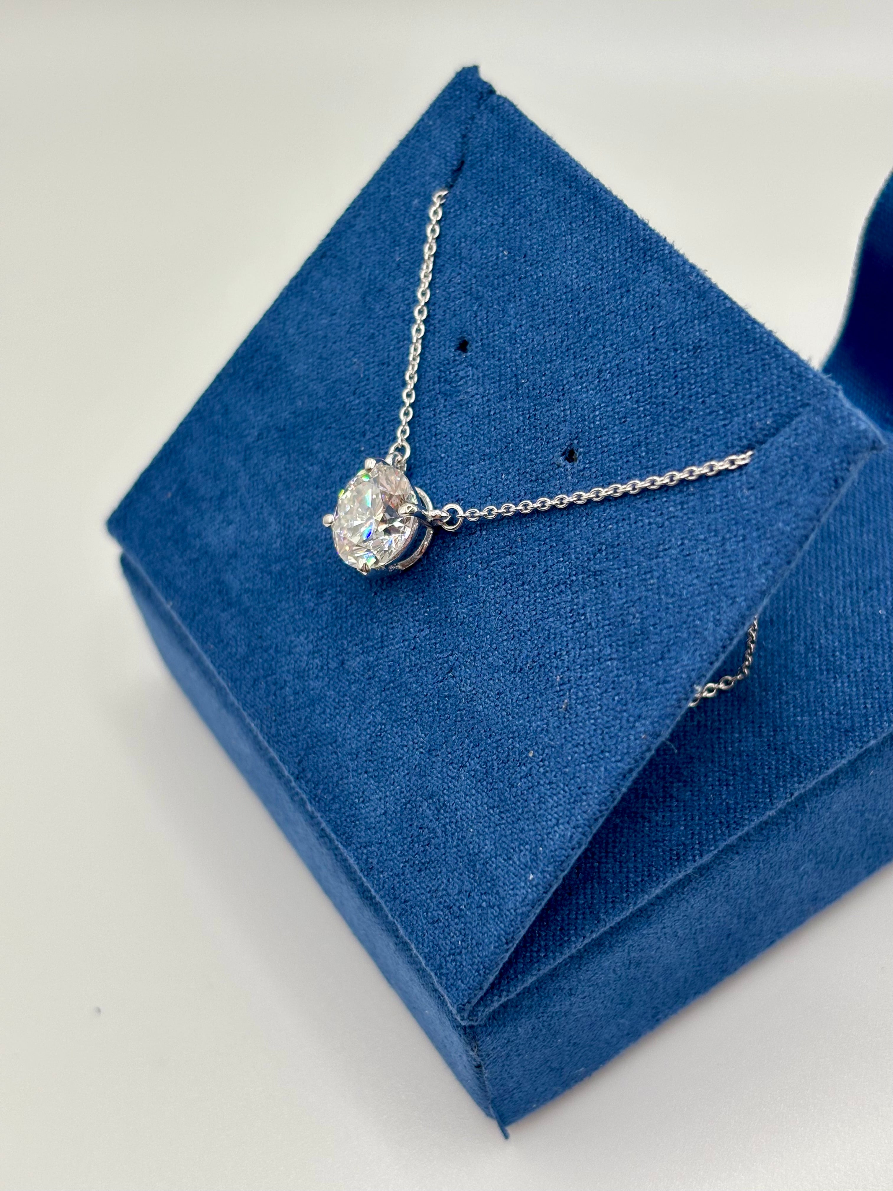 2ct lab diamond station necklace in 14K white gold, angled view on blue velvet box