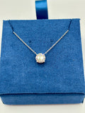 1.5 carat lab diamond solitaire station necklace in 14K white gold on blue velvet box, top view