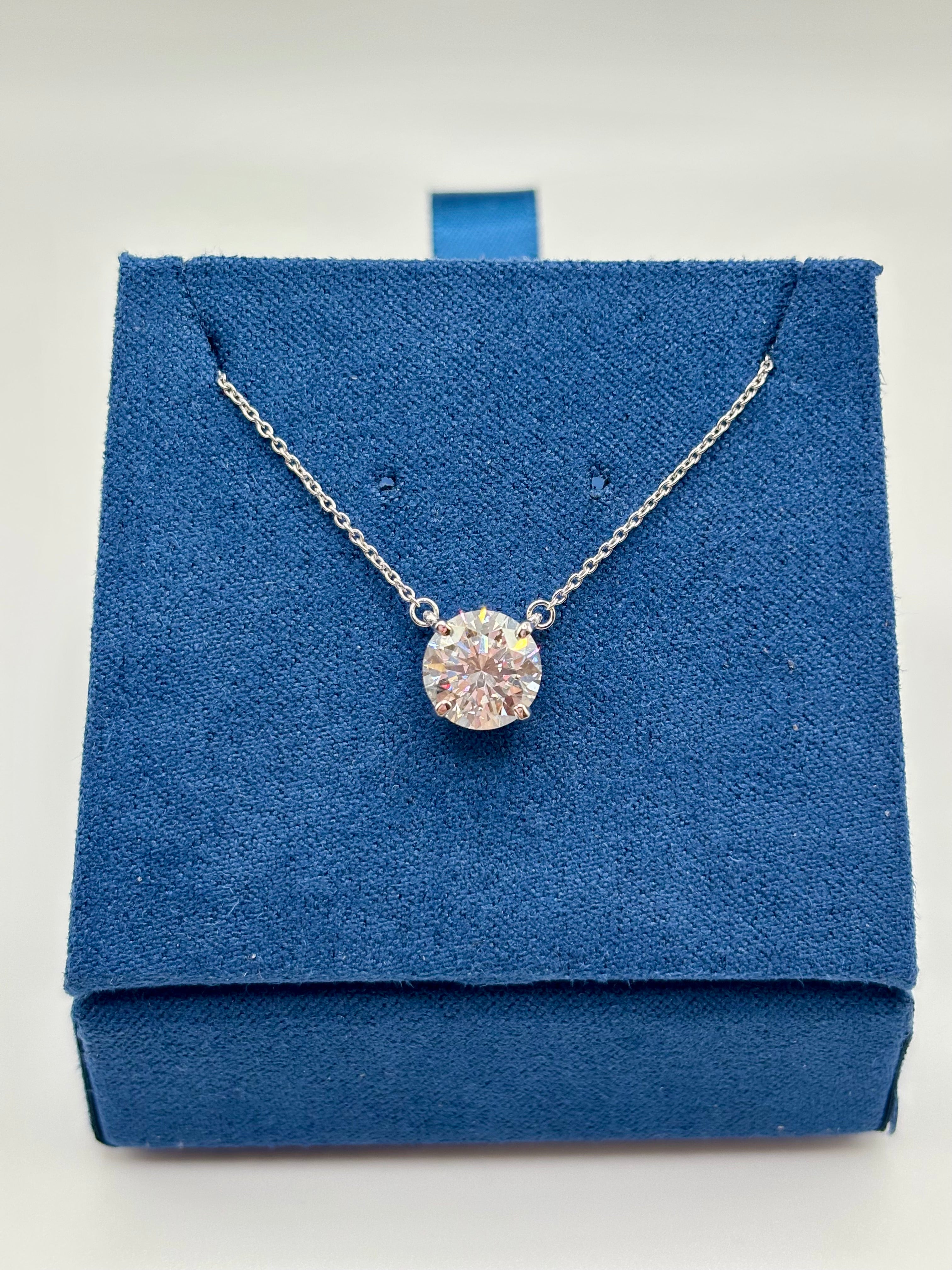 2 carat lab grown diamond solitaire necklace in 14K white gold on blue box, full view