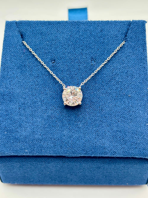 1.5ct lab diamond pendant on 14K white gold cable chain, top view on blue box